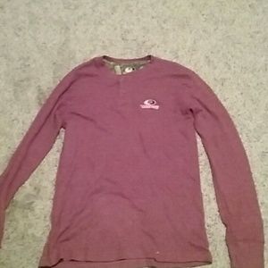 A flanel long,sleeve a hoodie,a long sleeve shirt